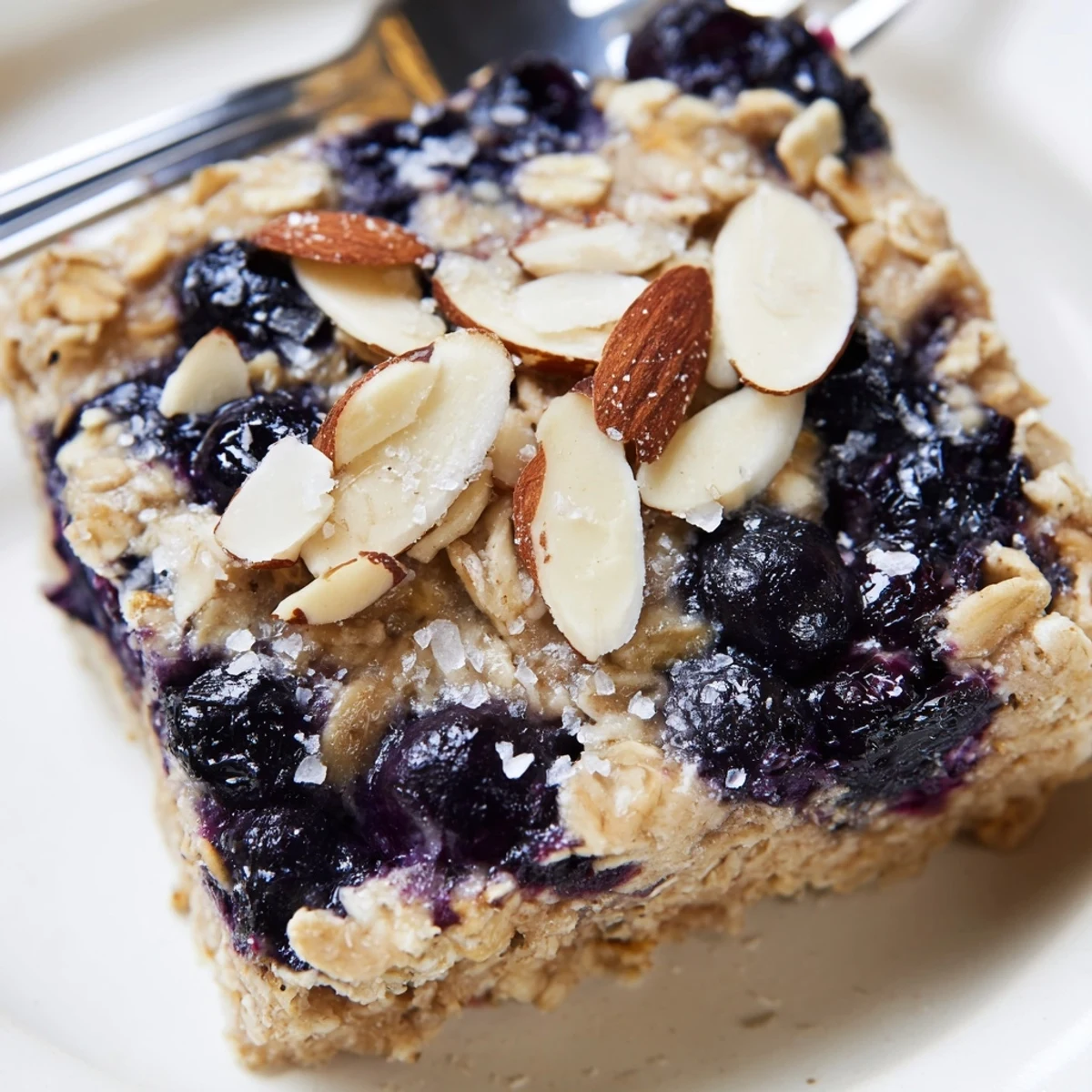 Golden blueberry cottage cheese breakfast bake with juicy berries bubbling through tender baked oats