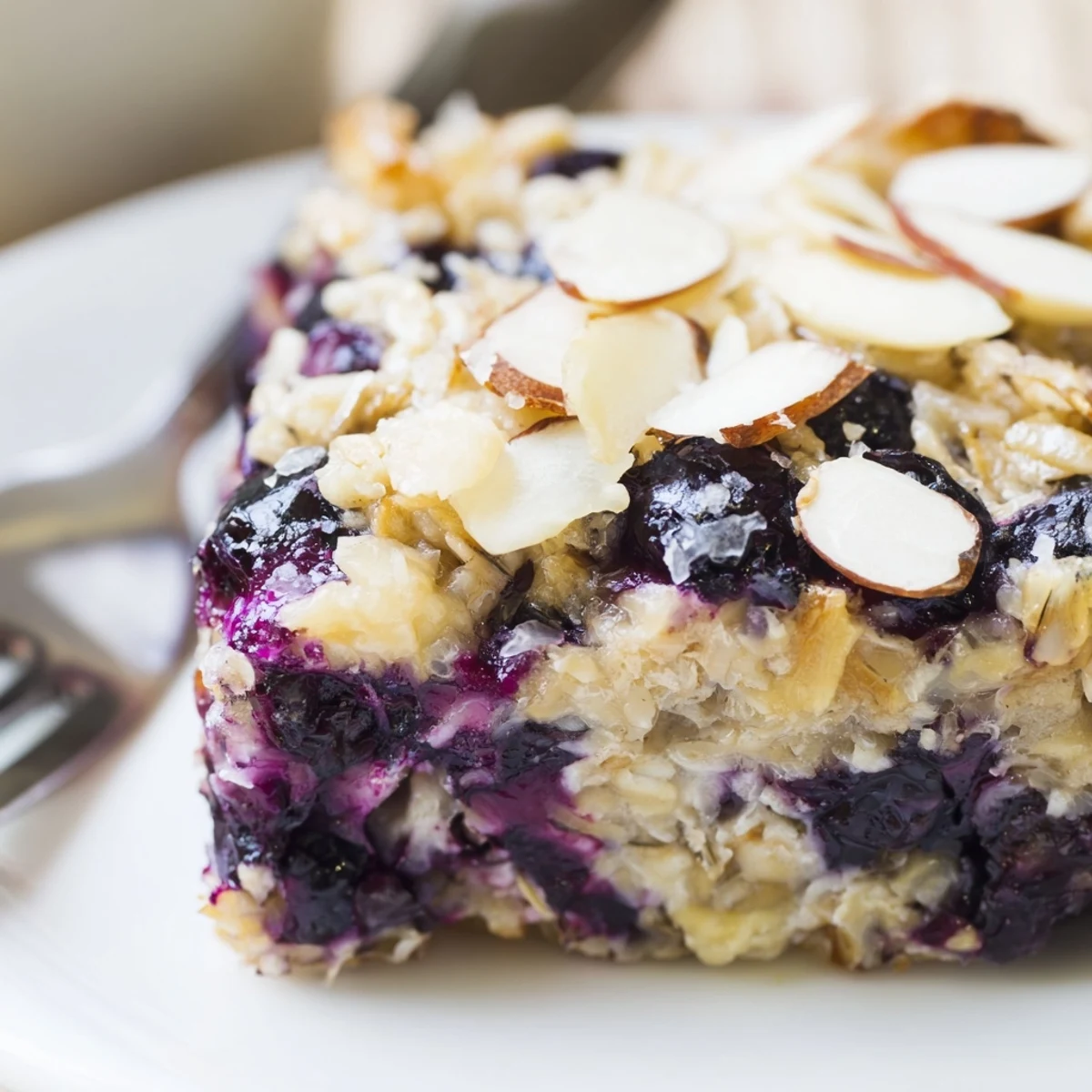 Fresh blueberry cottage cheese breakfast bake straight from the oven with golden brown crispy topping