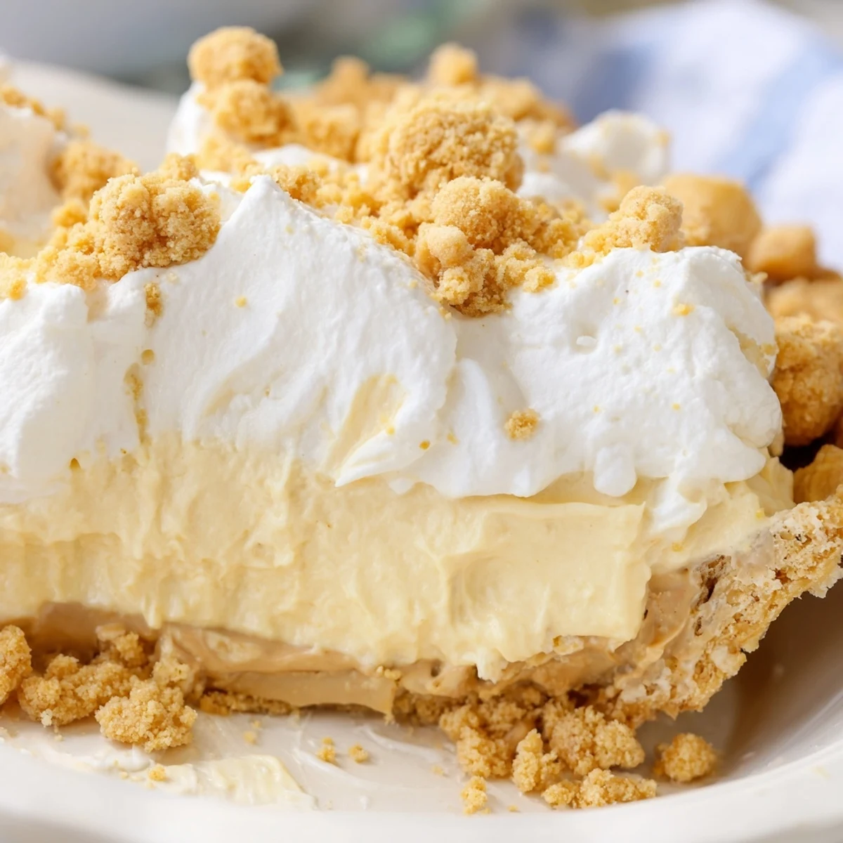 Old Fashioned Amish Peanut Butter Dream Pie slice revealing velvety custard filling in flaky golden crust