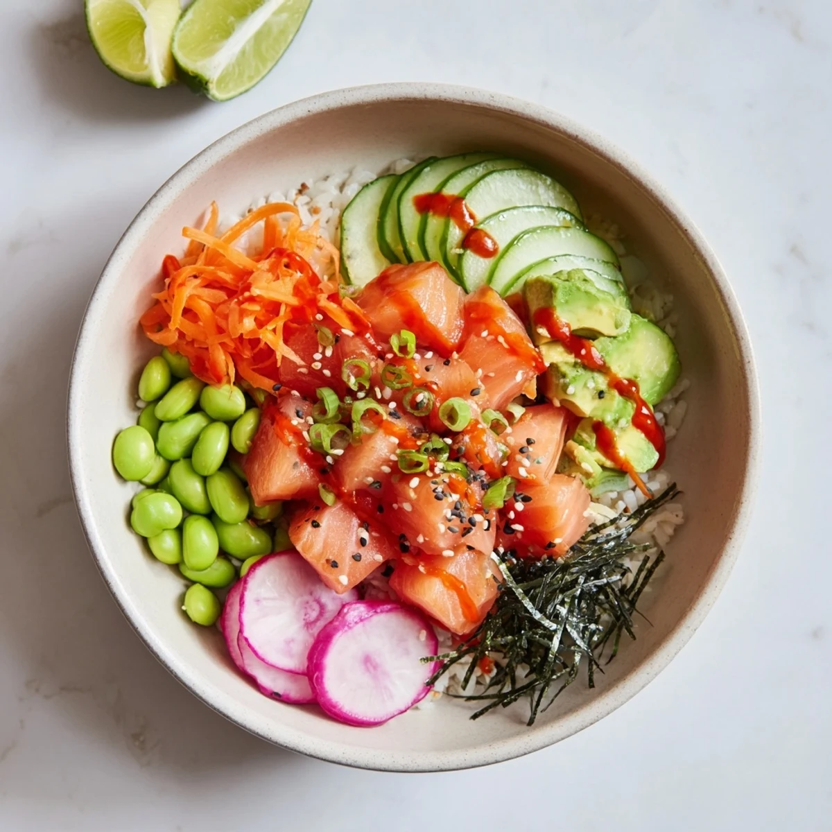 Vibrant bowl featuring marinated salmon cubes, creamy avocado, and crunchy vegetable toppings