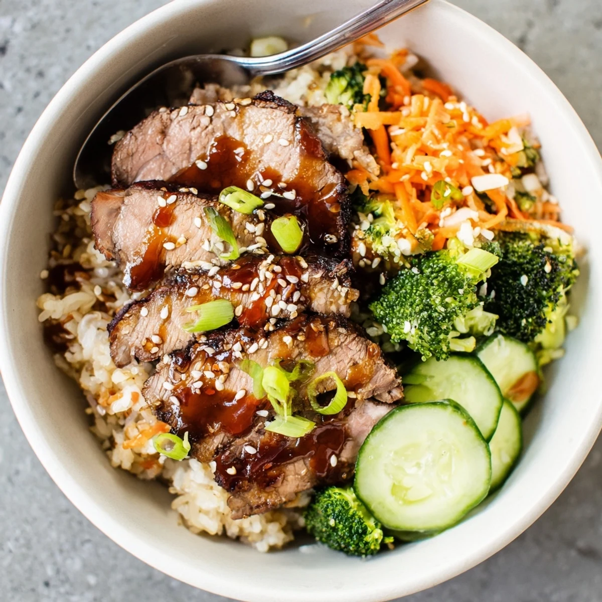 Savory Char Siu Beef Rice Bowl with glossy caramelized beef and sesame