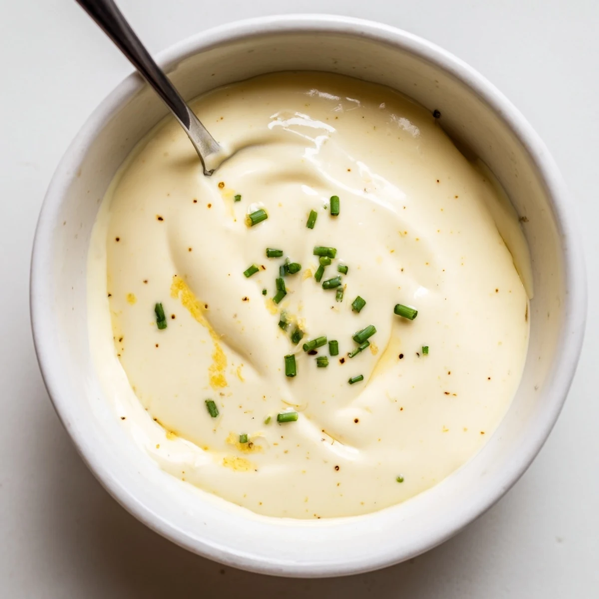 Creamy Tangy Sauce drizzled over grilled salmon, silky with bright lemon notes