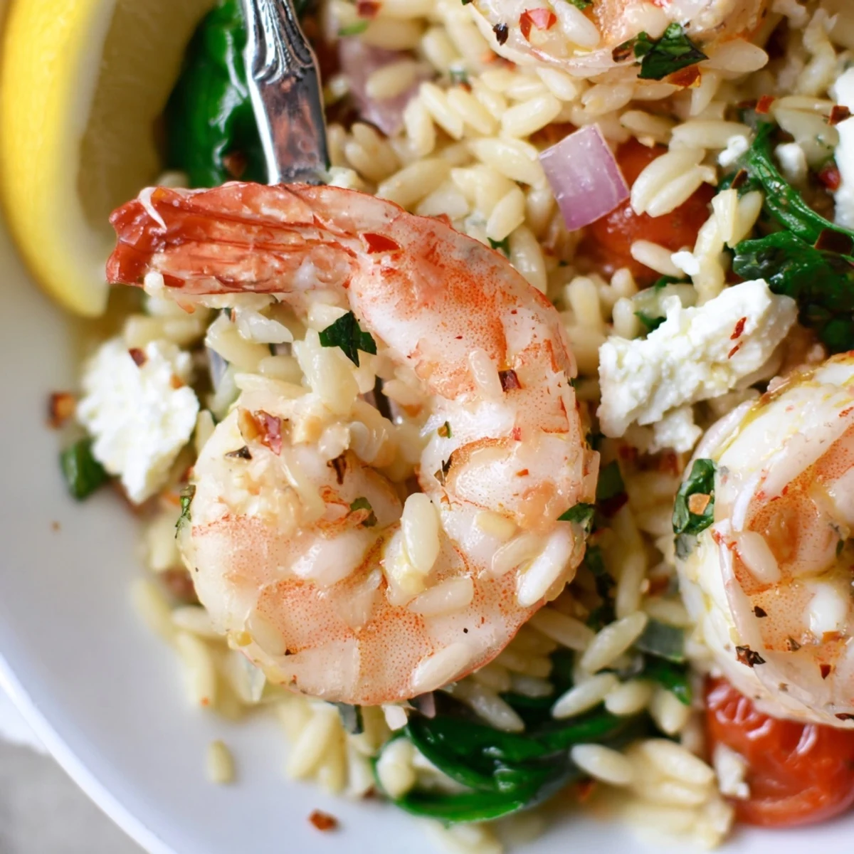 Warm Lemon Feta Orzo Shrimp Recipe tossed with wilted spinach and parsley