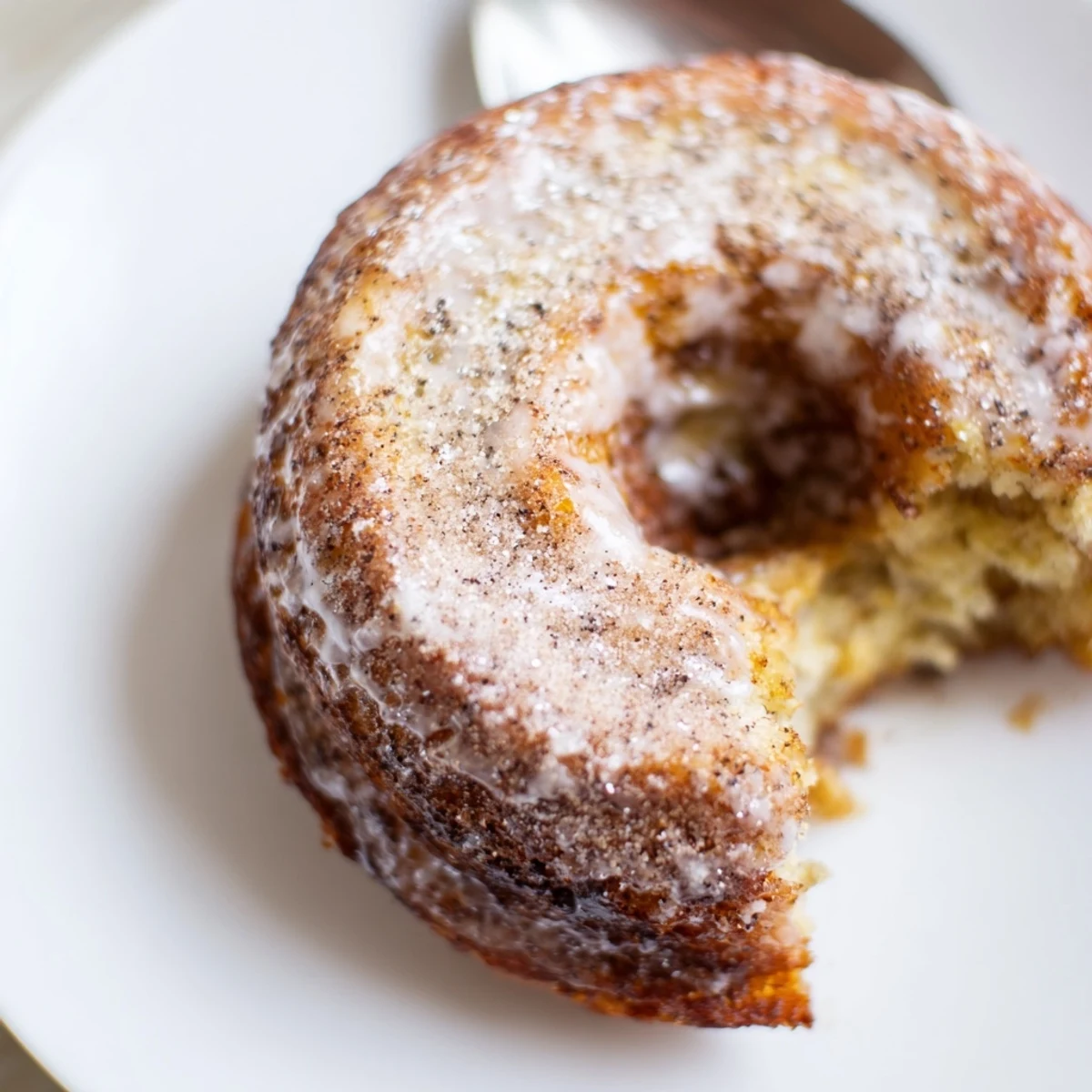 Warm Banana Donuts fresh from the oven, golden edges and soft centers.