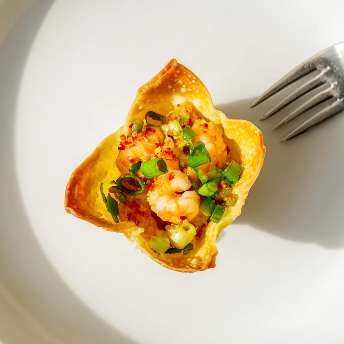 Crispy Shrimp Wonton Cups With Lime Cream, golden cups topped with bright cilantro