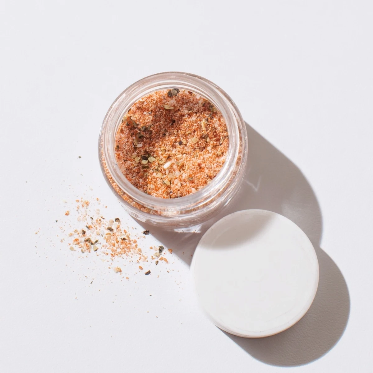 Homemade French fry seasoning blend ingredients arranged in small bowls including paprika garlic powder and salt for mixing