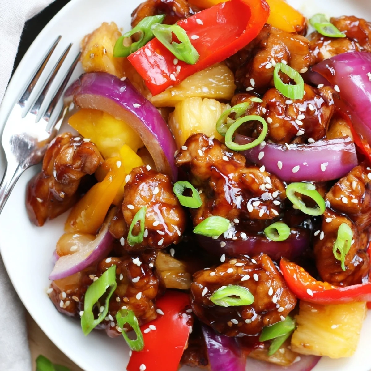 Juicy Hawaiian chicken thighs coated in a glossy sweet and tangy pineapple soy sauce