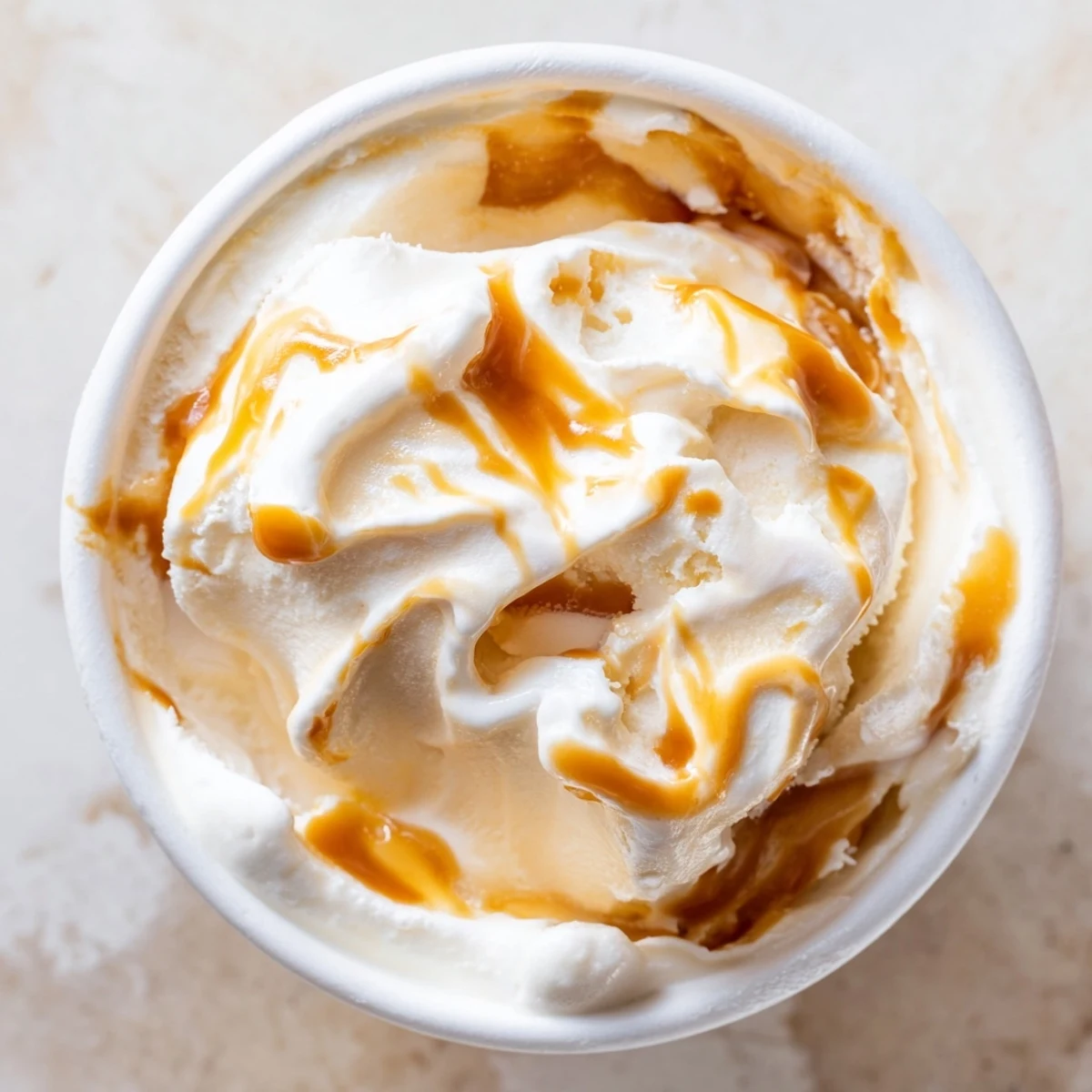 Golden salted caramel ribbons swirl through this creamy no churn ice cream.